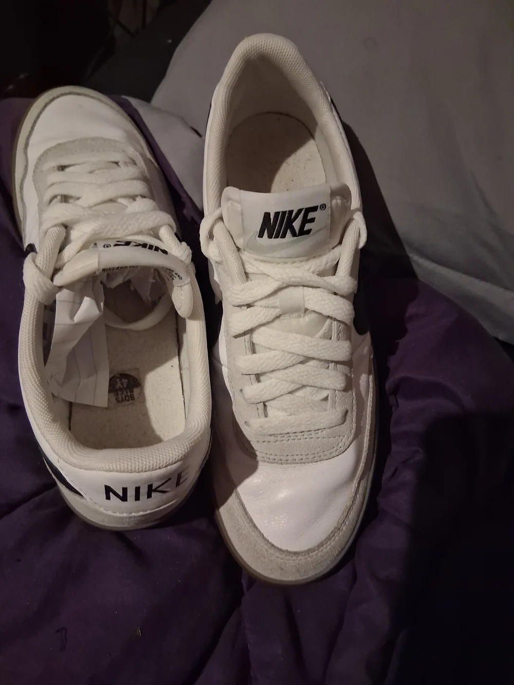 Nike White Sneakers with Black Swoosh